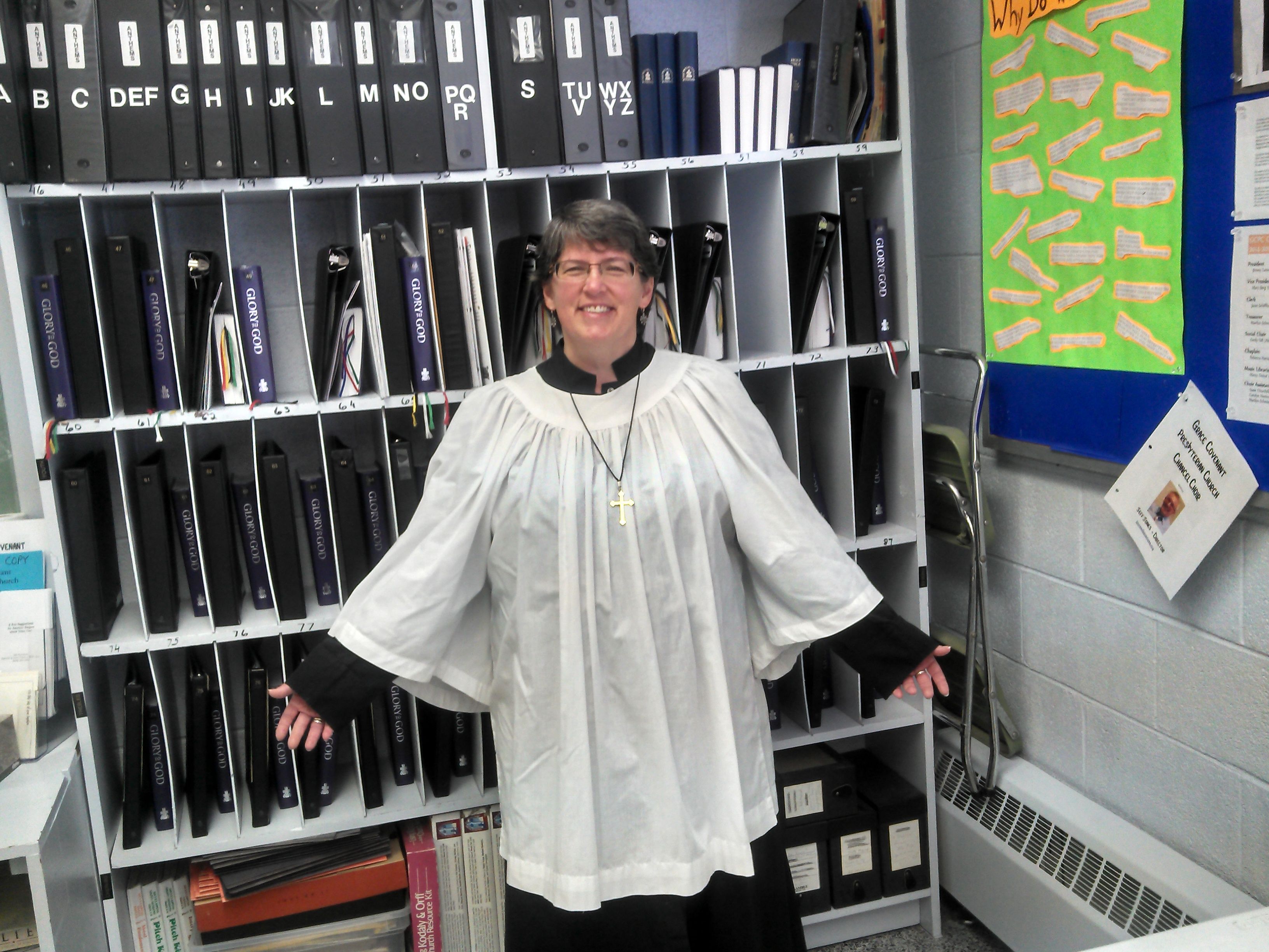 Sherrie McCleary-Small modeling our wonderful choir robes.